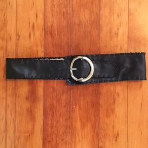 Black leather asymmetrical belt with silver buckle